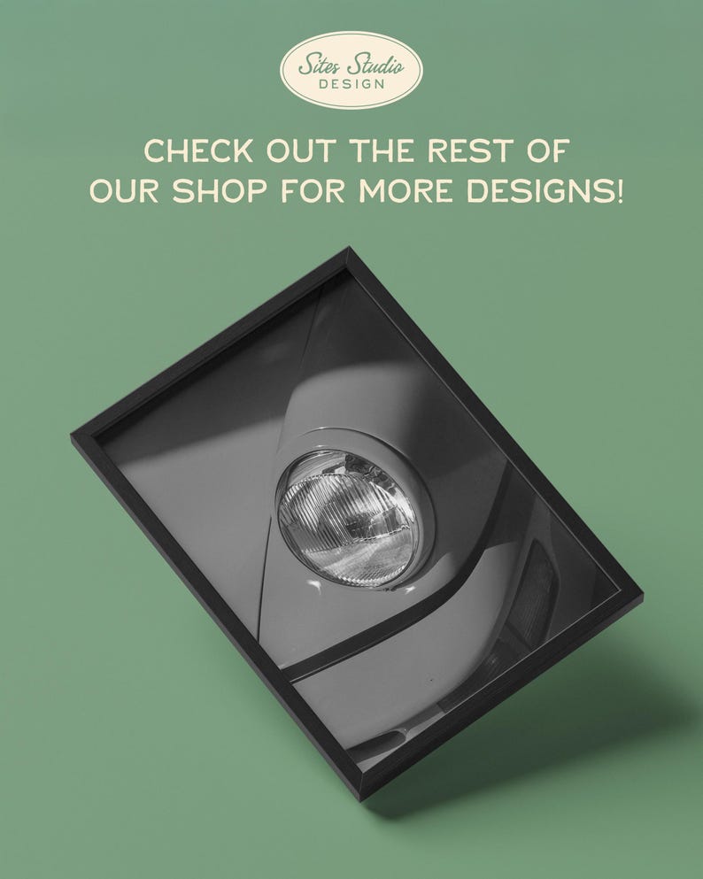 May include: Black and white framed print featuring a close-up of a vintage car headlight. The print is angled, with the headlight and surrounding bodywork in sharp focus. The background is a muted green. Text on the print reads: "CHECK OUT THE REST OF OUR SHOP FOR MORE DESIGNS!"