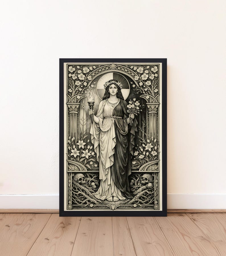 A framed black and white art print featuring a central figure wearing a floral crown, holding a flaming torch and a bouquet of flowers. The figure stands between two pillars, surrounded by intricate floral patterns and skulls at the base.
