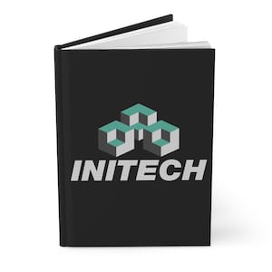 May include: A black journal with the word "INITECH" in white, beneath a teal and gray geometric design. The journal is open, revealing white pages. The cover is a solid black color.