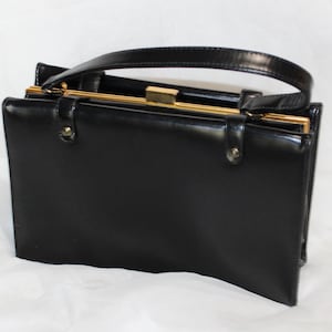 Cartera con asa de cuero negro estructurado estilo vintage de Hilco