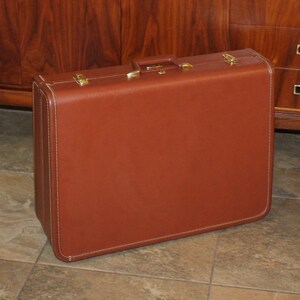 taperlite vintage luggage
