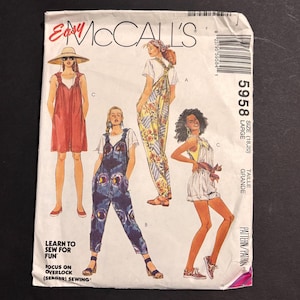 May include: An Easy McCall's 5958 sewing pattern envelope for size Large (18, 20). The front features illustrations of four different garment styles including a dress, long overalls, and short overalls, with text reading Learn to Sew for Fun.