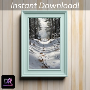 Peut inclure: Une impression encadrée d'un paysage hivernal avec un cadre bleu clair. L'œuvre représente un sentier enneigé serpentant à travers une forêt de grands arbres. Le texte "Instant Download!" est en haut. Le logo DreamRender est en bas à gauche.