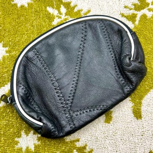 Bolsa de cuero con ribetes y parche vintage