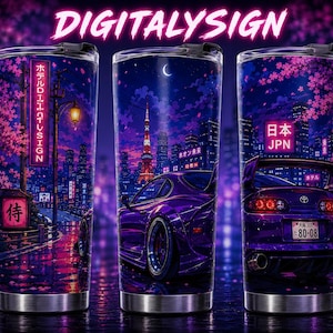May include: Stainless steel travel tumblers with a vibrant Japanese-inspired design. Each tumbler features a purple cityscape with a car, cherry blossoms, and Japanese text. The tumblers have a black lid and a silver base, with the text "DIGITALYSIGN" in pink.