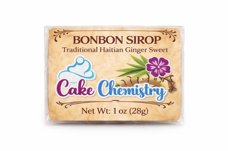 May include: A rectangular package with the text "BONBON SIROP" and "Traditional Haitian Ginger Sweet." The package features a cupcake illustration, a purple flower, and the words "Cake Chemistry." Net weight is 28g.