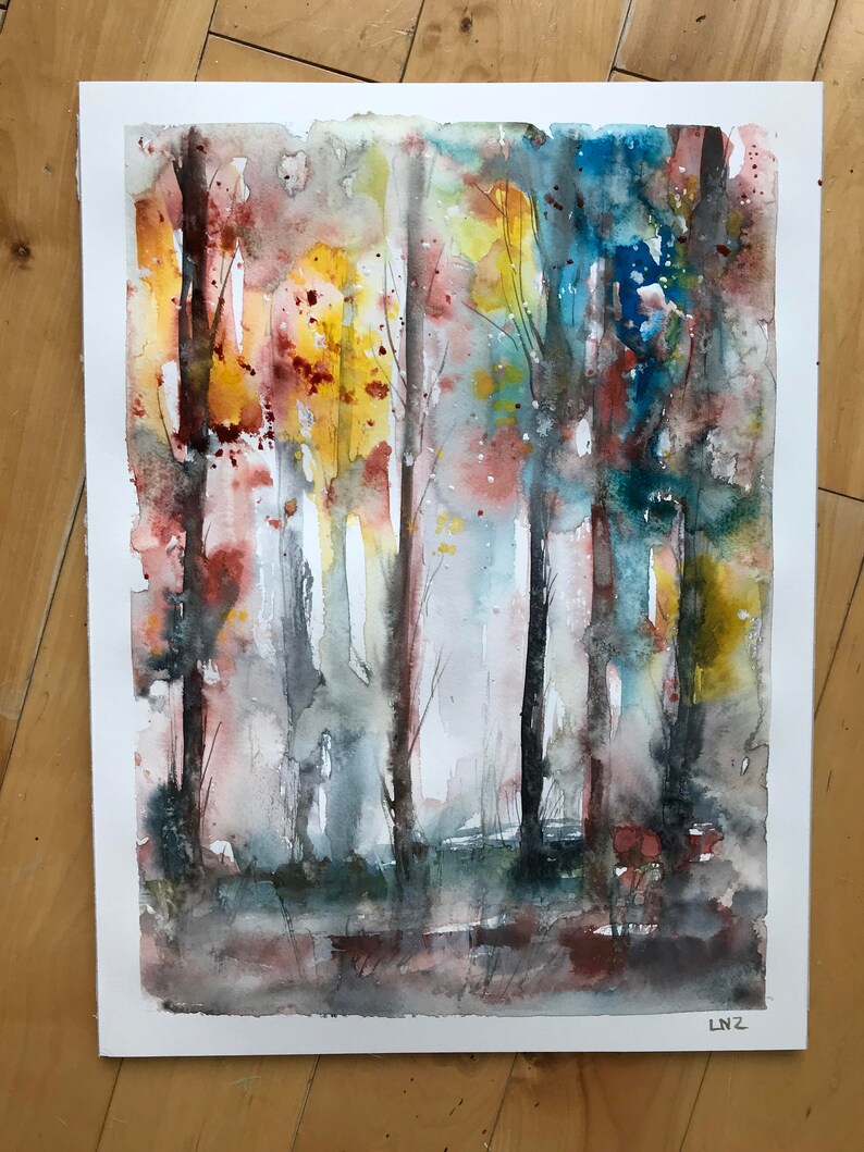 May include: Watercolor painting of a forest scene with tall, slender trees. The artwork features a palette of warm colors, including yellow, orange, and red, contrasted with cool blues and greens. The painting has a soft, ethereal quality.