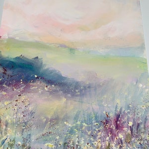 May include: An abstract landscape painting with a soft color palette of pink, green, and blue. The artwork features a field of wildflowers in the foreground and a hazy sky. The text "Somerset Velvet Giclee" is visible.