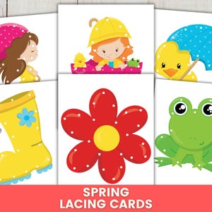 May include: A collection of spring-themed lacing cards with bright illustrations. The cards depict a girl with an umbrella, a duck with an umbrella, a yellow wellington boot, a red flower, and a green frog. The text "SPRING LACING CARDS" is at the bottom.