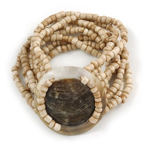 Meerstrengige antiek witte glaskraal met schelpmotief flexibele armband - 18 cm l