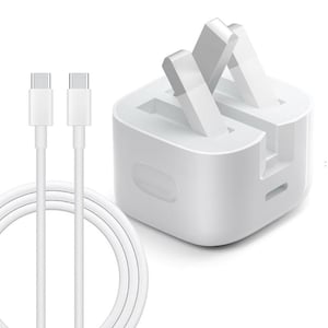 May include: A white power adapter with a UK plug design, featuring two prongs and a rectangular body. Two white USB-C cables are coiled nearby. The charger is designed for electronic devices.