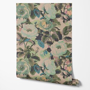 May include: A floral wallpaper pattern with large, light blue flowers and dark green leaves on a light beige background.