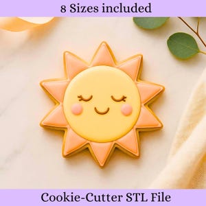 Puede incluir: Un cortador de galletas con forma de sol con una cara sonriente, mejillas sonrosadas y ojos cerrados. El sol tiene un centro amarillo y rayos rosas. El texto en la parte superior dice "8 tamaños incluidos" y en la parte inferior "Cookie-Cutter STL File".