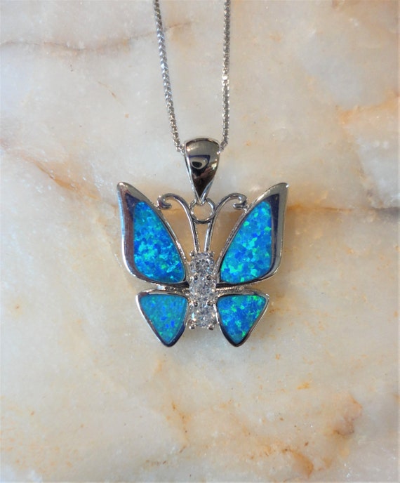 Dragonfly Pendant Synthetic Blue Opal Inlay and Cubic Zirconia Accents Sterling Silver, Pendant Only Dragonfly Pendant Synthetic Blue Opal Inlay and Cubic Zirconia Accents Sterling Silver, Pendant Only