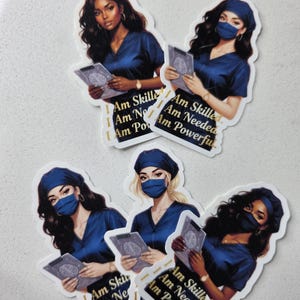 May include: A set of stickers featuring illustrations of women in blue scrubs and face masks, holding clipboards. The stickers have text that reads "I Am Skilled, I Am Needed, I Am Powerful."