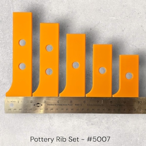 May include: A set of five orange pottery ribs of varying sizes, each with a circular hole. The ribs are arranged from largest to smallest and are placed next to a ruler. The text "Pottery Rib Set - #5007" is at the bottom.