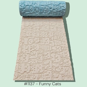May include: A light blue patterned roller with a repeating design of cat faces, creating a textured pattern on a beige surface. The text "#1137 - Funny Cats" is at the bottom.