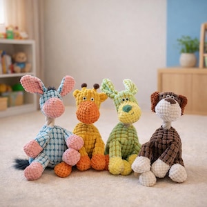 May include: Four plush animal toys: a donkey, giraffe, dog, and a bunny. The donkey is blue and pink, the giraffe is yellow and orange, the bunny is green and yellow, and the dog is brown and white. Each toy has a rope neck.