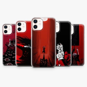 May include: A collection of five phone cases featuring bold, graphic illustrations in red, black, and white. The designs depict characters and scenes with a dark, anime-inspired aesthetic. Each case has a clear, protective border.