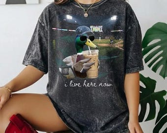I Live Here Now Goose Shirt, Funny Baseball Fan Tee, Vintage Ballpark Duck Shirt, Softball Tournament Graphic Tee, Sports Humor T-Shirt