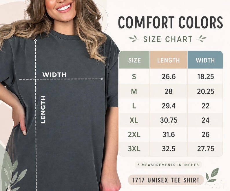 May include: A charcoal gray short-sleeve t-shirt paired with a Comfort Colors size chart. The chart displays length and width measurements in inches for sizes S through 3XL, specifically for the 1717 unisex tee shirt model, with clear labels.