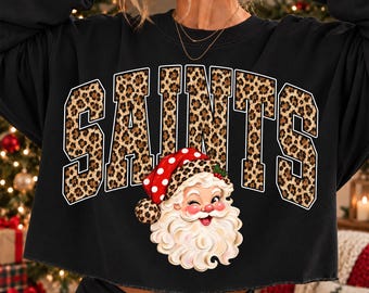 Saints Christmas PNG, Santa Saints Mascot PNG, Leopard Saints PNG, Varsity School Spirit Shirt Design, Holiday Sublimation Png