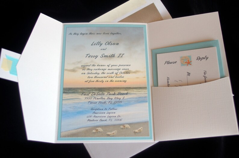 May include: A wedding invitation with a beach sunset background. The invitation reads "As they begin their new lives together, Lilly Olson and Terry Smith II request the honor of your presence as they exchange marriage vows on Saturday, the sixth of October, two thousand and twelve at five thirty in the evening. Fort DeSoto Park Beach, 3500 Pinellas Bay Way S, Tierra Verde, FL 33715. Reception to follow, American Legion, 600 American Legion Dr, Madeira Beach, FL 33708."
