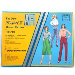 May include: A vintage AFI Magic-Fit Master Pattern box for pants. The box is blue with yellow and silver accents, featuring illustrations of women in pants. Text includes "The New Magic-Fit Master Pattern for PANTS."