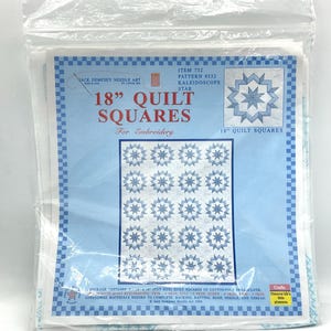 May include: A package of 18-inch quilt squares for embroidery. The package contains 45 squares of cotton poly fabric with a blue and white kaleidoscope star pattern. The package includes instructions for completing a quilt.