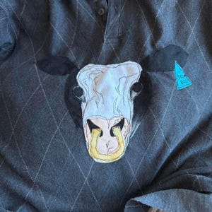 Suéter corto con cuello y patchwork "Cow Says Moo"