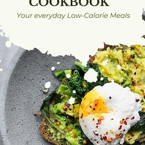 May include: The High-Protein Cookbook cover featuring avocado toast with a poached egg and chilli flakes. Text reads "Your everyday Low-Calorie Meals". The food is presented on a grey plate.