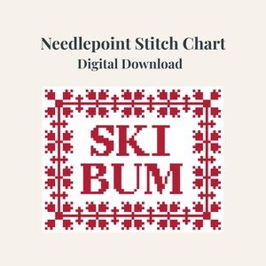 May include: A digital download needlepoint stitch chart. The design features the words "SKI BUM" in red block letters, framed by a red border with a repeating cross pattern. The text "Needlepoint Stitch Chart" and "Digital Download" are at the top.
