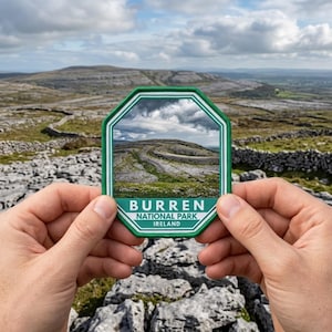 May include: An octagonal embroidered patch featuring a photographic print of the Burren National Park in Ireland. The patch has a green border with white stripes and displays the text BURREN NATIONAL PARK IRELAND in white letters.