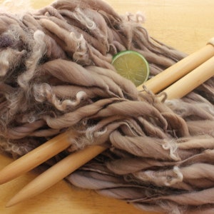Curly Yarn for Knitting, Handspun Art Yarn, thick and thin yarn, mauve yarn, super bulky hand dyed yarn, pastel purple yarn, merino yarn