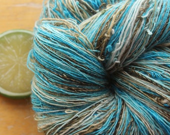 Handspun Yarn, hand dyed merino wool, laceweight yarn, brown and blue yarn, white sparkle yarn, turquoise yarn, glitter yarn, luxury yarn