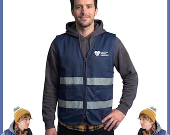 May include: A navy blue sleeveless vest featuring two horizontal reflective silver strips across the front, a full-length zip, and a white logo on the chest that reads Lightfoot Medical Transport, worn over a dark grey hooded sweatshirt.