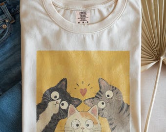 Maglietta con gatto curioso dai colori comodi, maglietta grafica retrò per mamme di gatti, maglietta con gattina dall'estetica vintage, regalo carino per amanti degli animali, top con animale stravagante