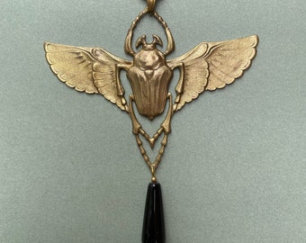 Polished Bronze Scarab Necklace With Black Onyx