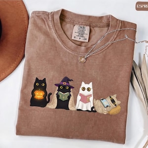 Cat reading shirt spooky season book lover gift for cat mom fall apparel funny ghost witch tee cozy autumn clothing