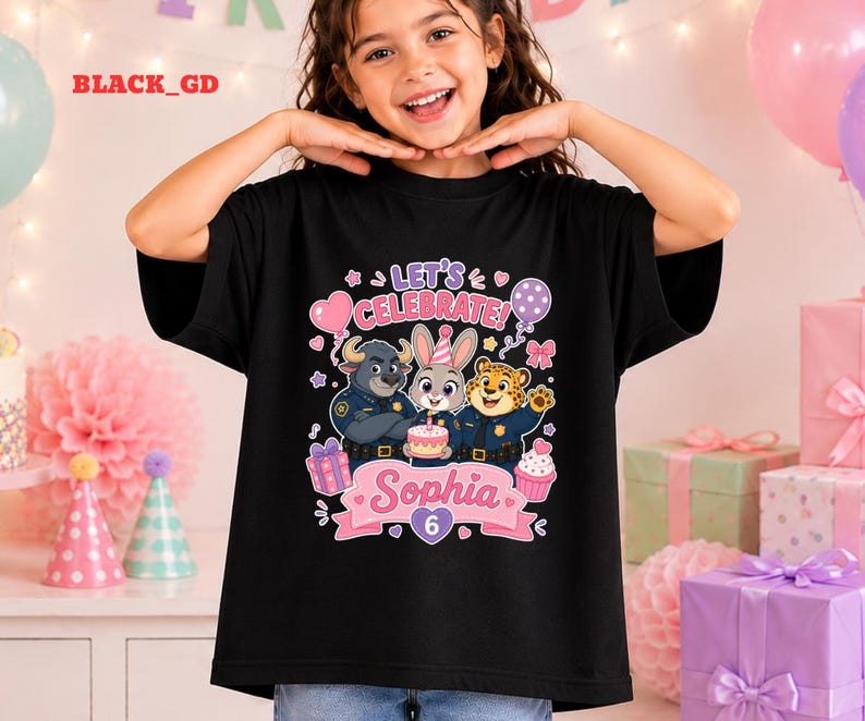 May include: Black t-shirt featuring a colorful graphic of Zootopia characters, a birthday cake, and the text "Let's Celebrate Sophia 6". The design includes a pink banner and various party-themed elements.