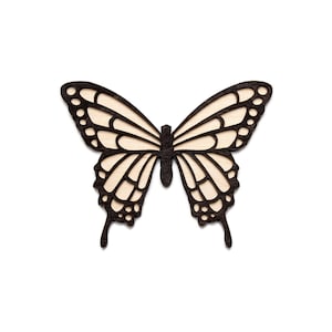 May include: A wooden butterfly cutout with a detailed design. The butterfly has a dark brown outline and a light brown interior. The wings are symmetrical with intricate patterns, perfect for crafts or decor.