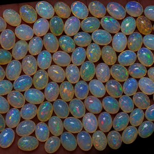 Gema de Ópalo Natural Suelta de Forma Ovalada de 8.55 Ct | Australiano Multicolor Certificado — Ideal para la Elaboración de Colgantes