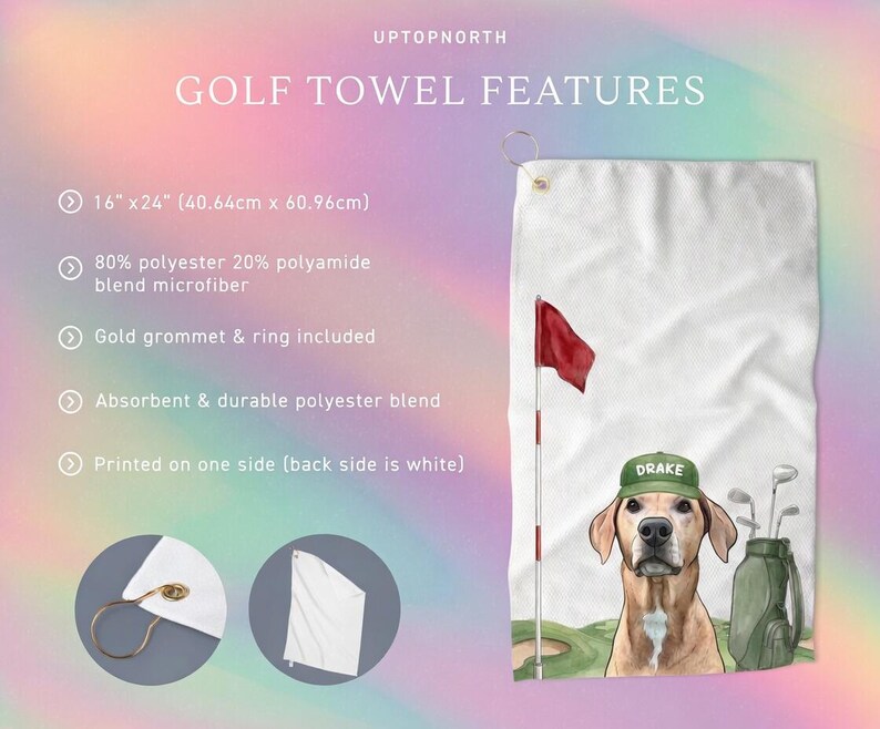 May include: White golf towel with a red flag, a dog wearing a green cap with the name "Drake", and golf clubs. The towel is 16" x 24" and made of a polyester blend. Features a gold grommet and ring.