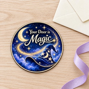 May include: A circular sign featuring a dark blue night sky with a crescent moon, a trail of golden stardust, and a blue wizard hat decorated with stars. The text "Your Door is Magic" is printed in white script lettering across the center.