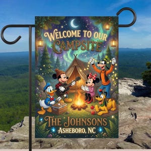 May include: A rectangular garden flag featuring a nighttime camping scene with Mickey Mouse playing guitar, Minnie Mouse, Donald Duck, and Goofy by a campfire. The text reads Welcome to our Campsite, The Johnsons, and Asheboro, NC.