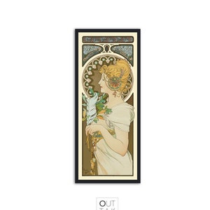 May include: A vintage art nouveau poster featuring a woman in a white dress holding a feather. The poster has a decorative border with floral and geometric designs in shades of green, blue, and gold.