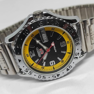Reloj automático vintage Seiko 6309: esfera negra y amarilla, fabricado en Japón imagen 4