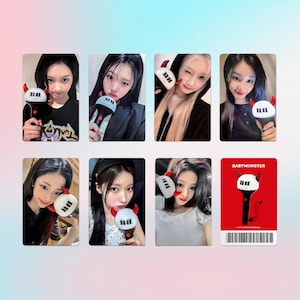 May include: A collection of eight images featuring a group of people holding a black and white light stick with red horns. One image is a red card with the text "BABYMONSTER" and a light stick illustration.