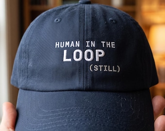 Human In The Loop Still Cap | AI Code Review Gift Hat For Software Pro Developer | Job Security Present For The Deadpan AI Era Programmer