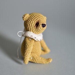 Beige miniature Teddy bear image 1